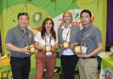 Showing brand-new packaging for SunGold kiwis are John Kang, Debbie Rogers, Karen Caruso and Shawn Wen with Zespri.